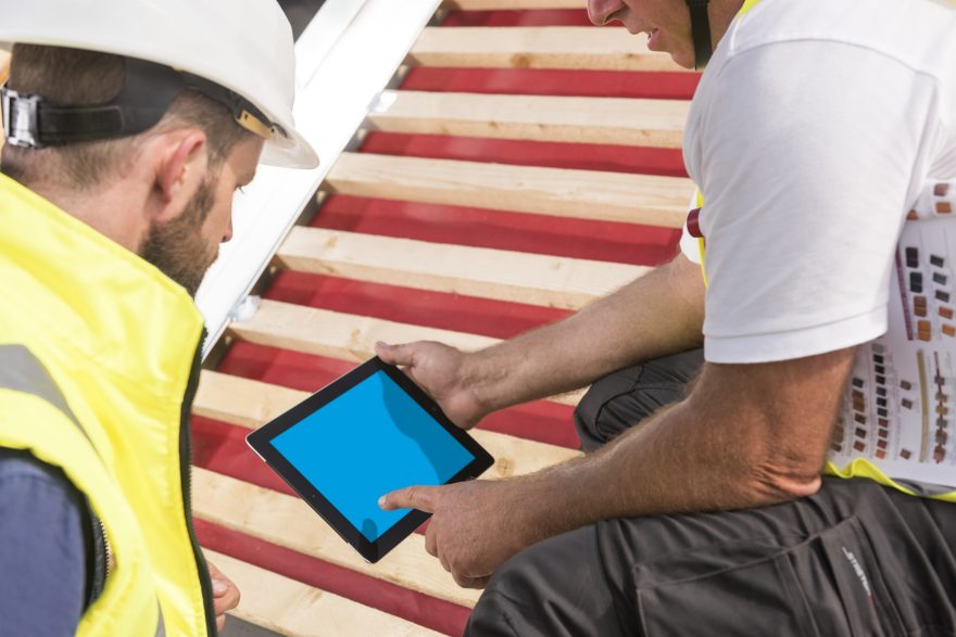 Roofers with ipad - layered version with bluescreen