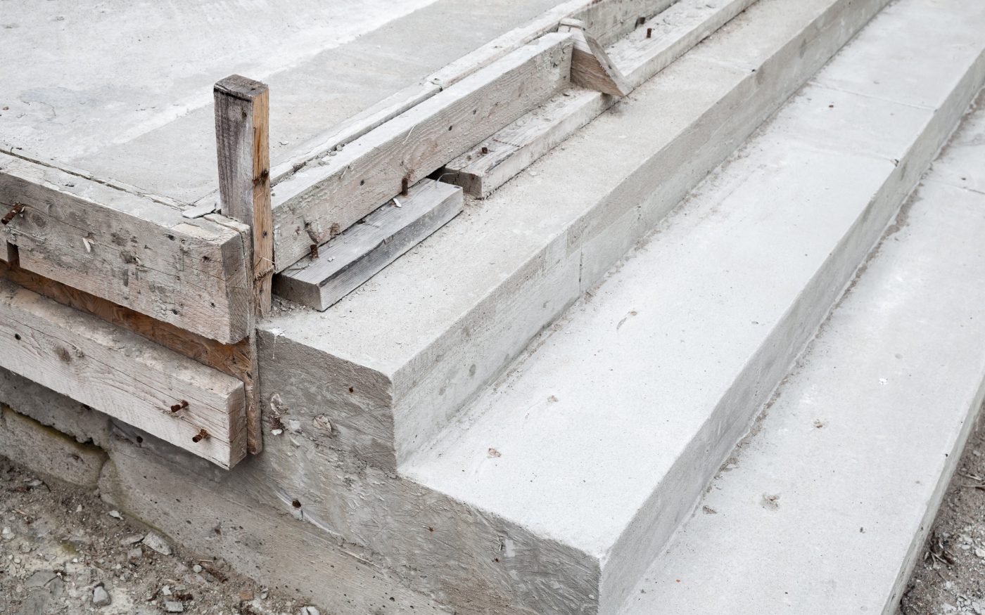 White stairs under construction, concrete steps and timber forms