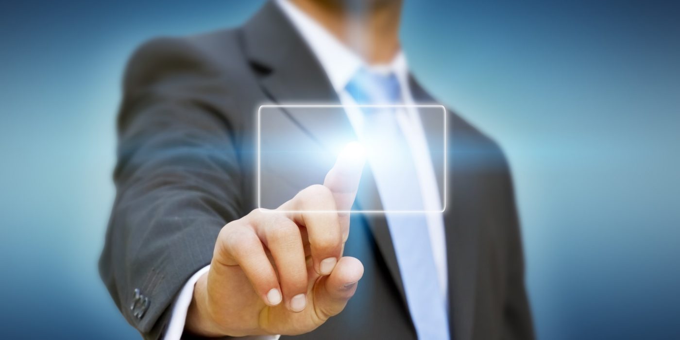 Businessman using digital interface with his fingers