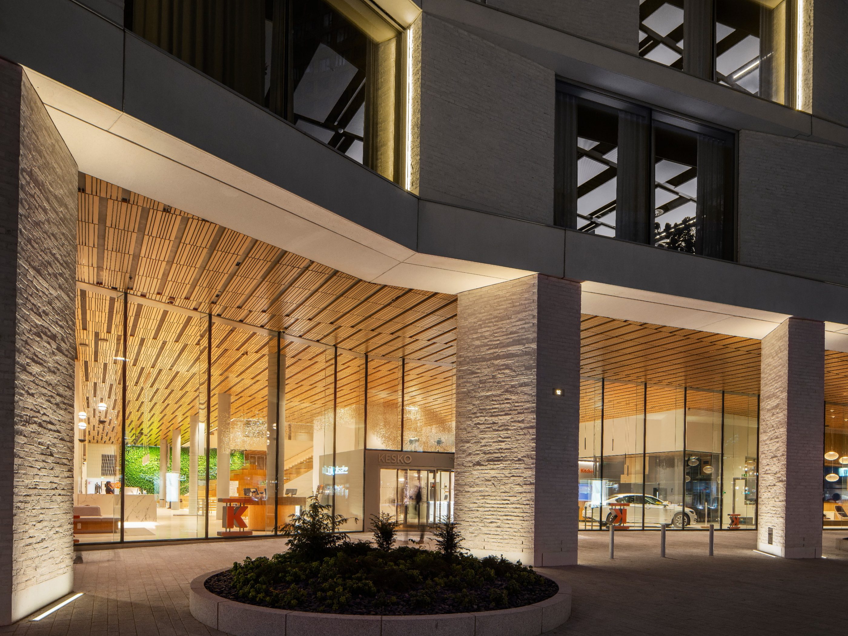 K-Kampus. Brick Award 22 Category "Working together". JKMM Architects. outside view at night